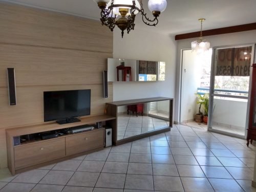 1 vista parcial da sala com movel planejado